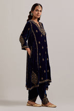 Navy blue easy fit A-line, panelled, short kurta set in silk velvet with all-over hand embroidery at the neck, sleeves and hem.