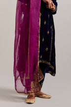 Navy blue easy fit A-line, panelled, short kurta set in silk velvet with all-over hand embroidery at the neck, sleeves and hem.
