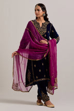 Navy blue easy fit A-line, panelled, short kurta set in silk velvet with all-over hand embroidery at the neck, sleeves and hem.