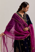 Navy blue easy fit A-line, panelled, short kurta set in silk velvet with all-over hand embroidery at the neck, sleeves and hem.