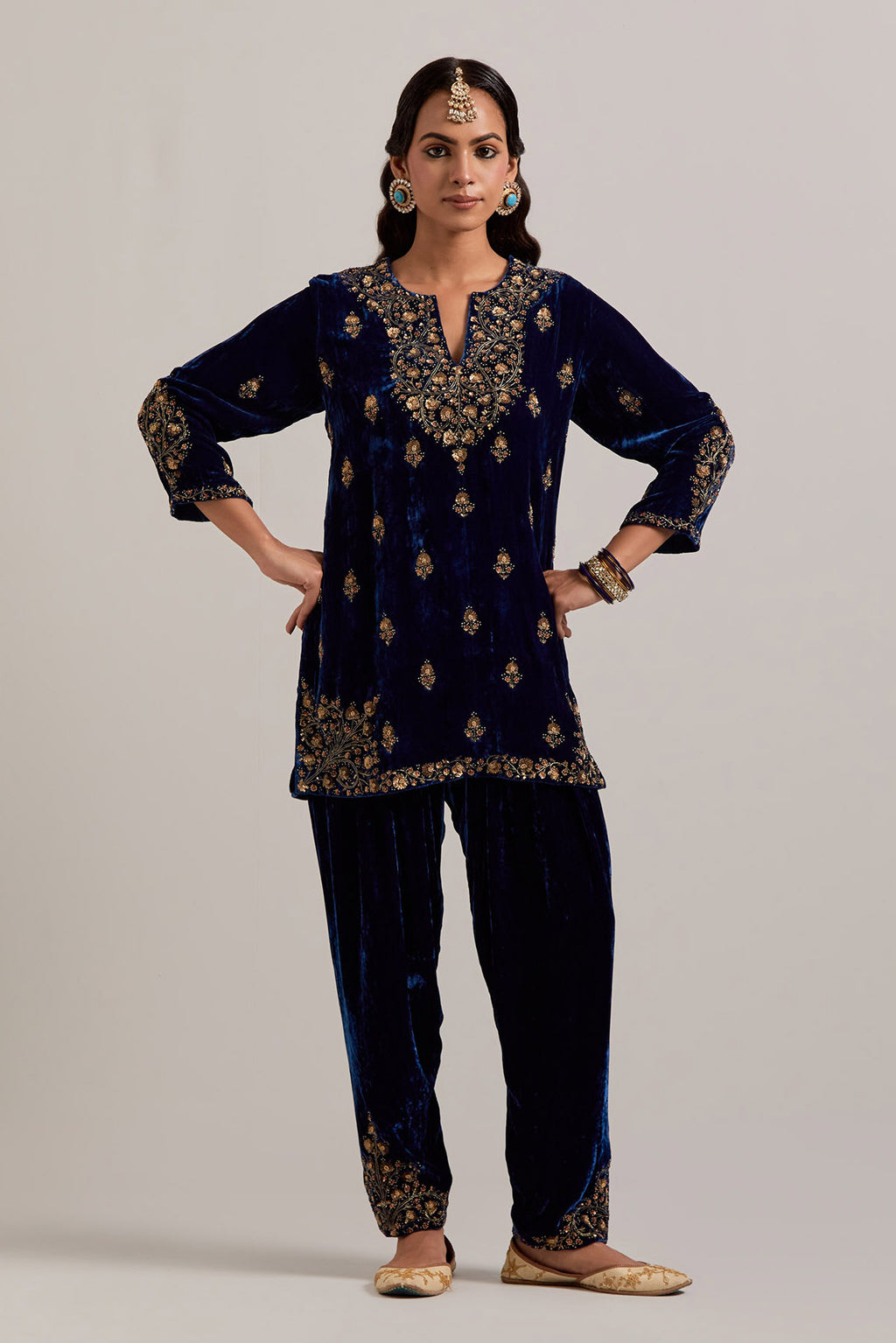 Navy blue straight Silk Velvet short kurta set with all-over hand-embroidered bead, sequins, zardozi and zari work.