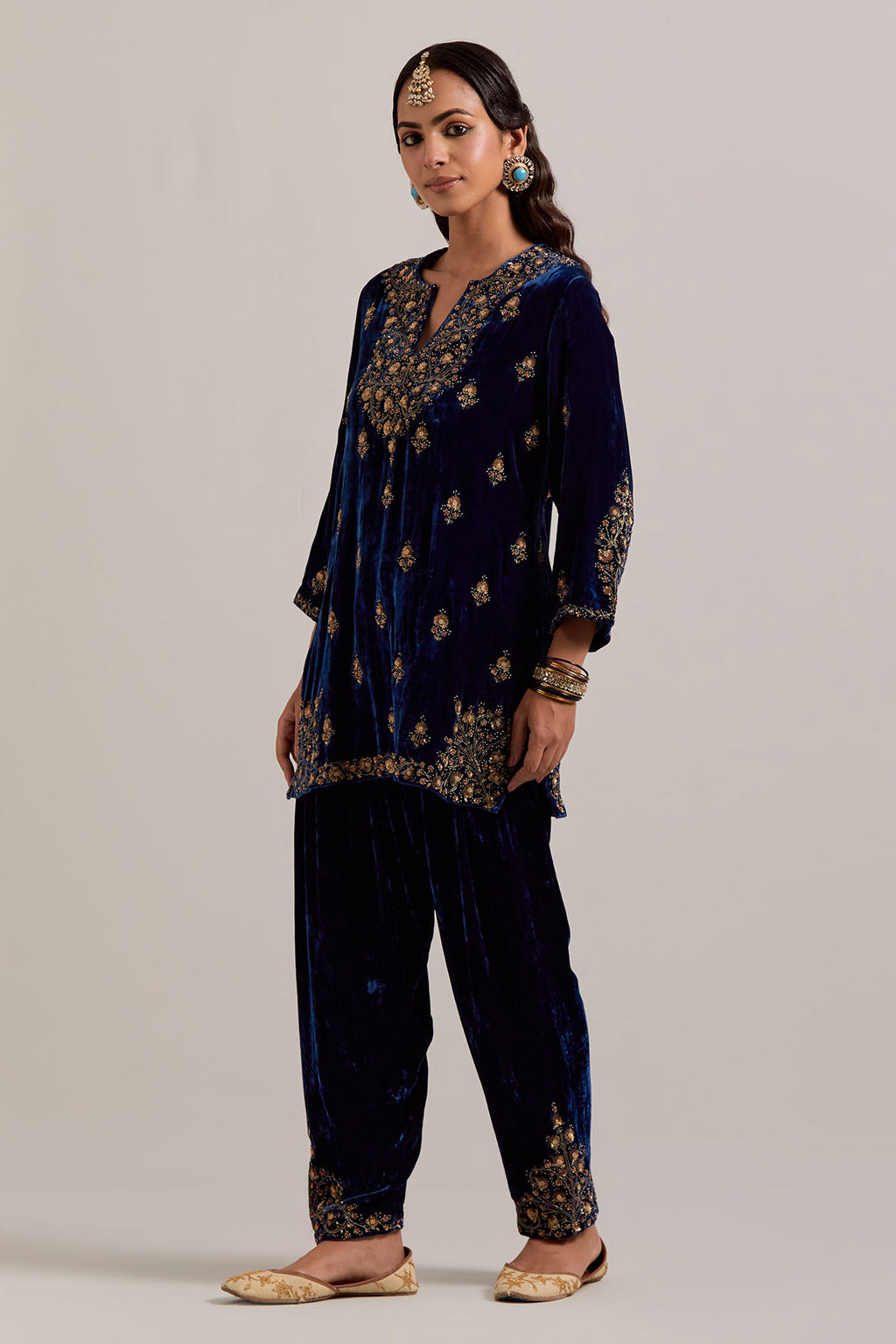Navy blue straight Silk Velvet short kurta set with all-over hand-embroidered bead, sequins, zardozi and zari work.