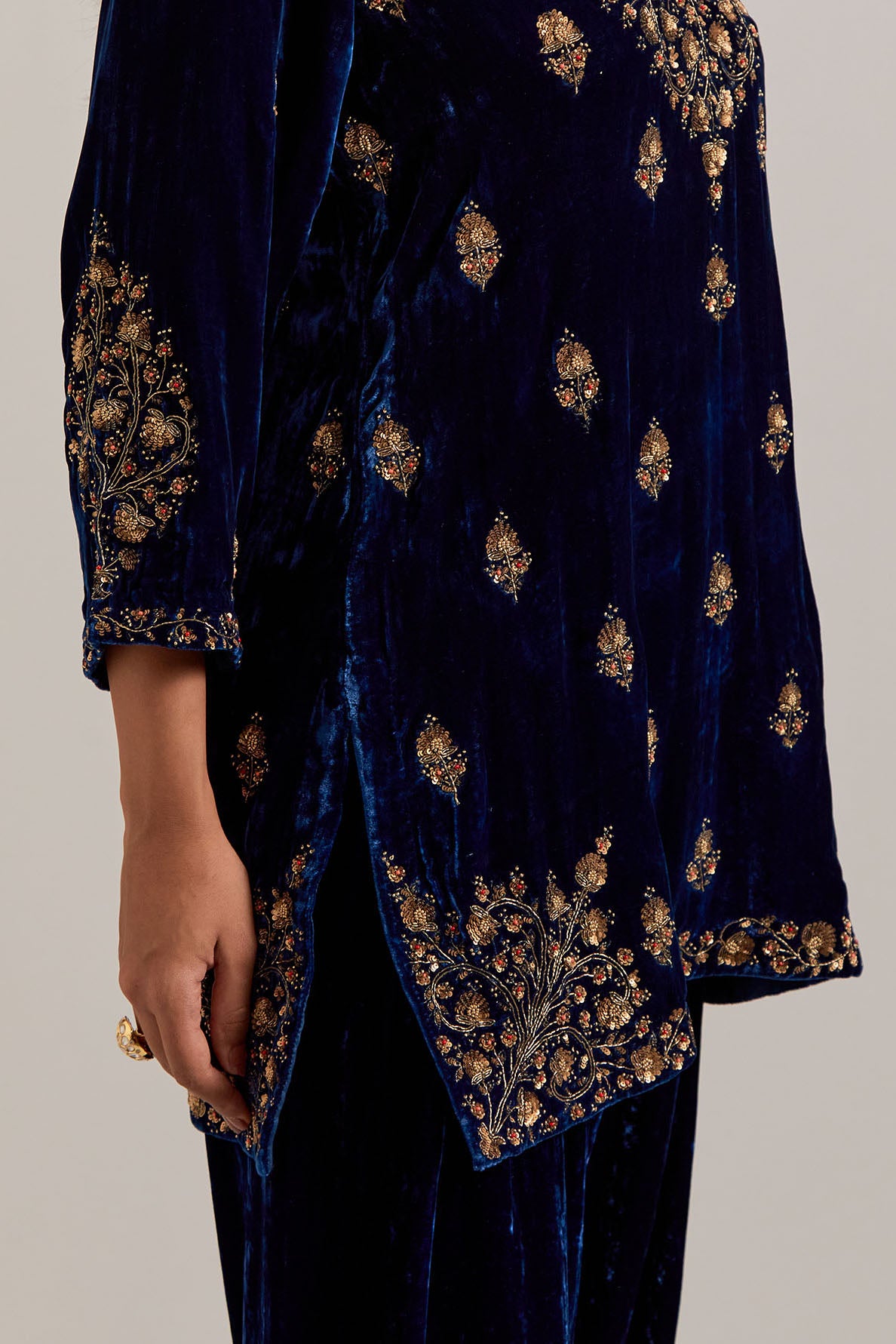 Navy blue straight Silk Velvet short kurta set with all-over hand-embroidered bead, sequins, zardozi and zari work.