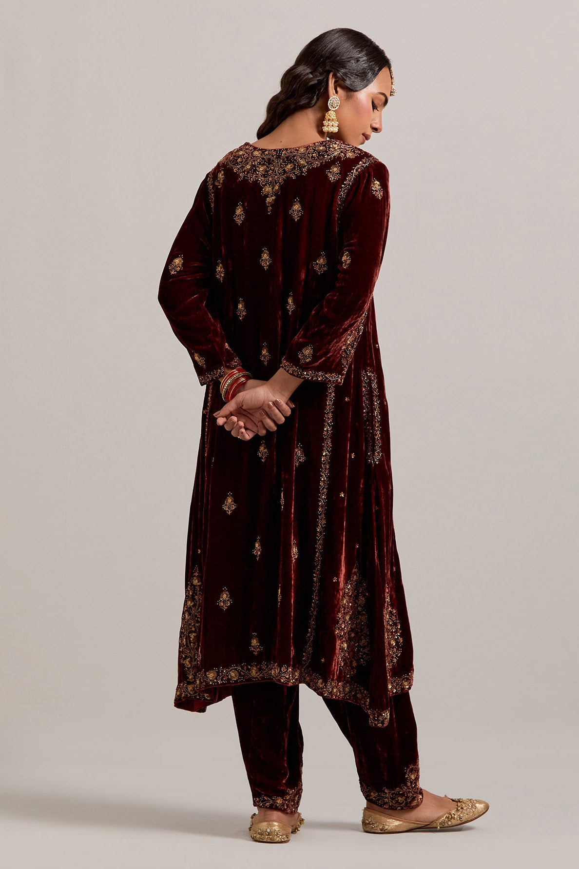 Burnt umber easy fit A-line, panelled, short kurta set in silk velvet with all-over hand embroidery at the neck, sleeves and hem.
