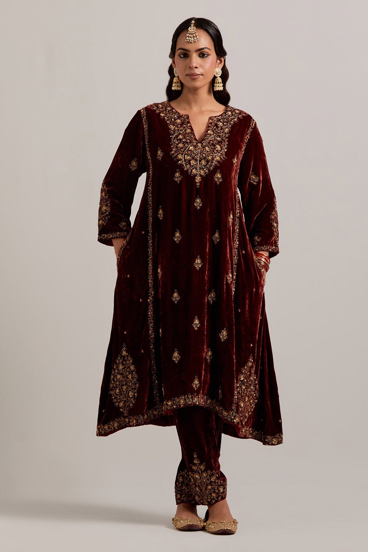 Burnt umber easy fit A-line, panelled, short kurta set in silk velvet with all-over hand embroidery at the neck, sleeves and hem.