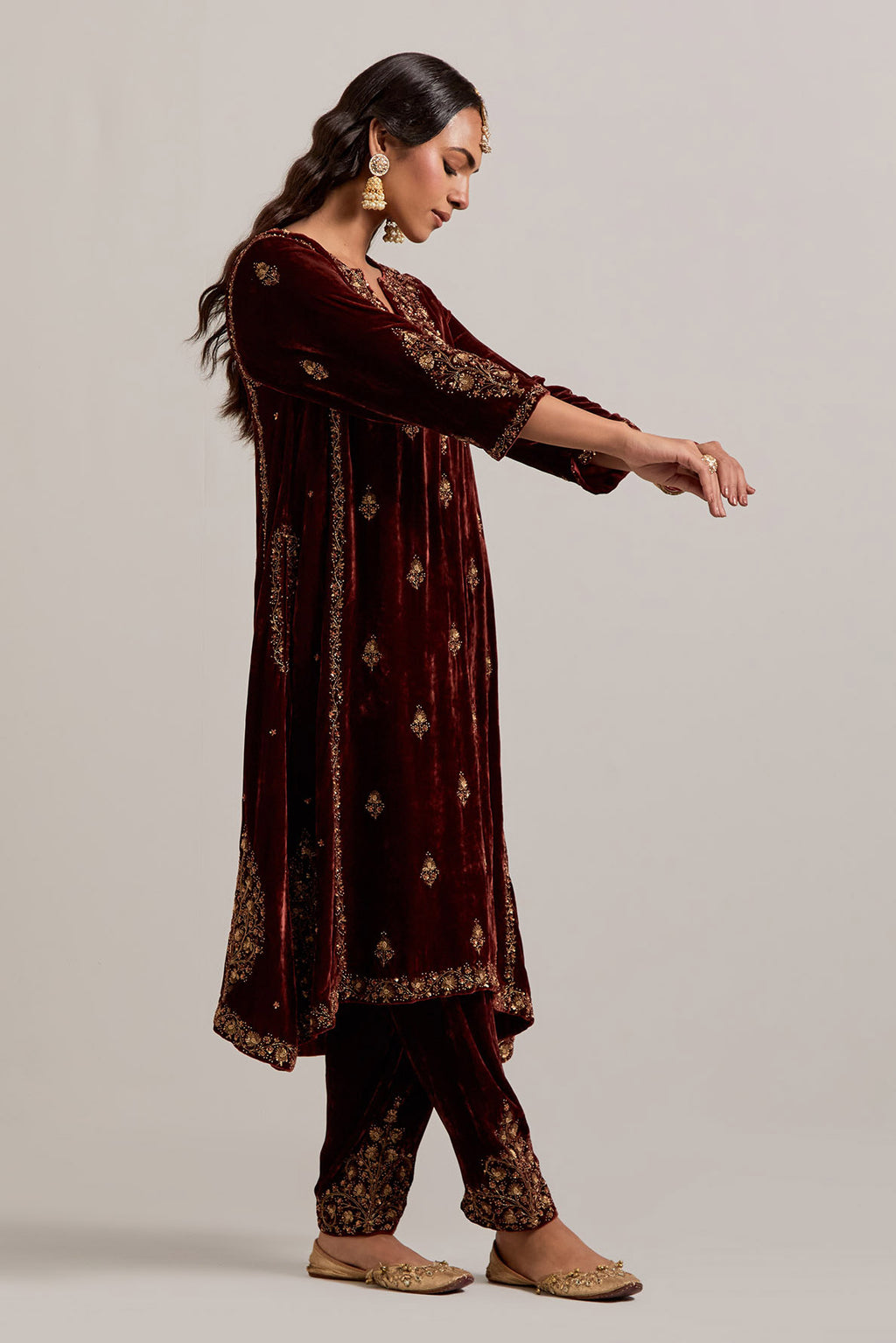 Burnt umber easy fit A-line, panelled, short kurta set in silk velvet with all-over hand embroidery at the neck, sleeves and hem.
