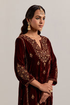 Burnt umber easy fit A-line, panelled, short kurta set in silk velvet with all-over hand embroidery at the neck, sleeves and hem.