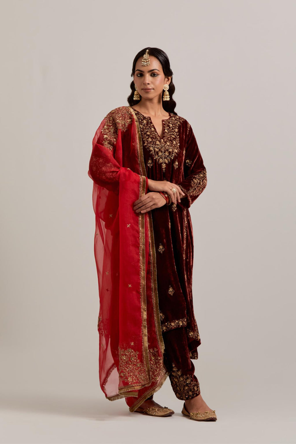 Red silk organza dupatta with delicate sequins, zardozi and zari work, highlighted with contrast bead work.