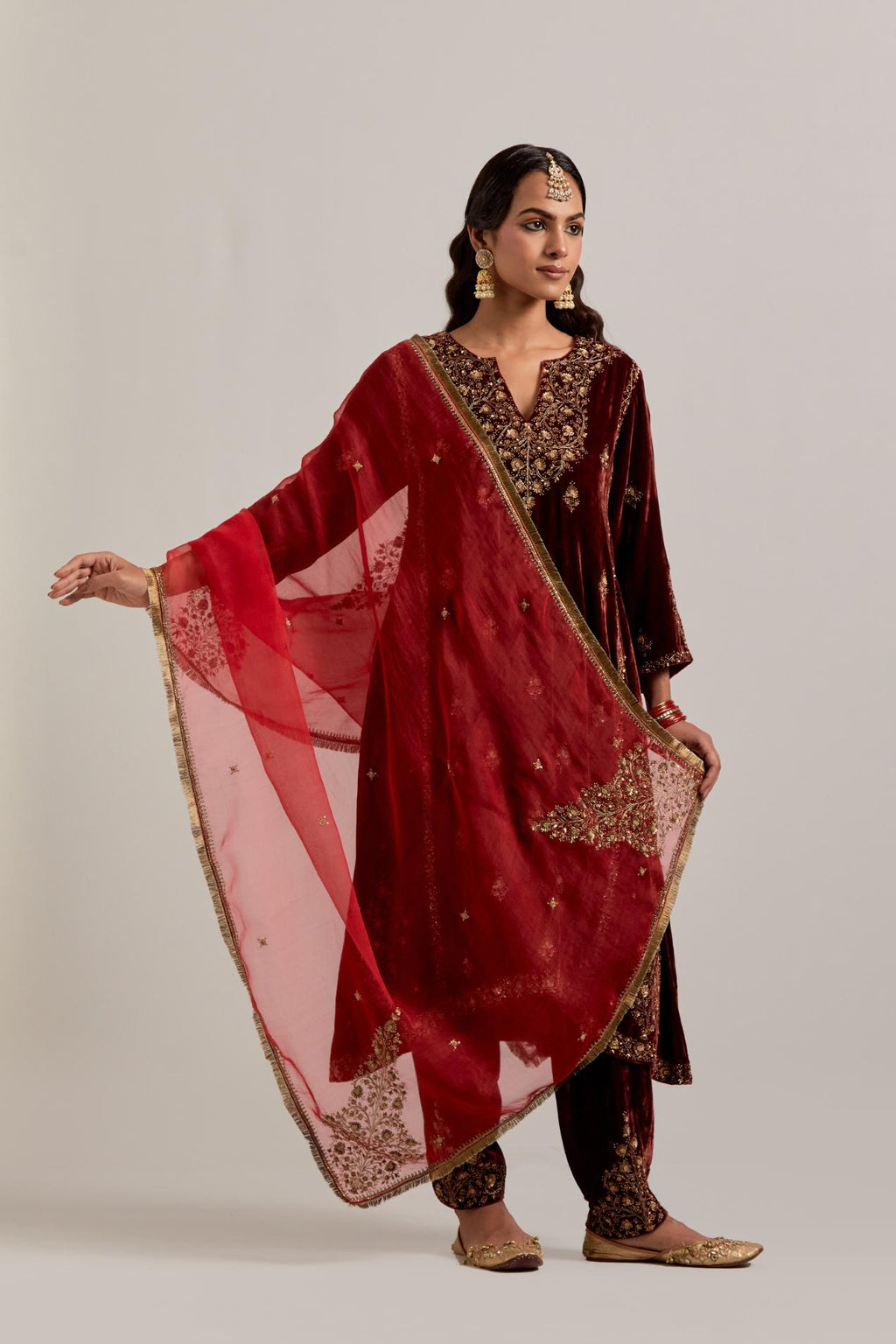 Red silk organza dupatta with delicate sequins, zardozi and zari work, highlighted with contrast bead work.