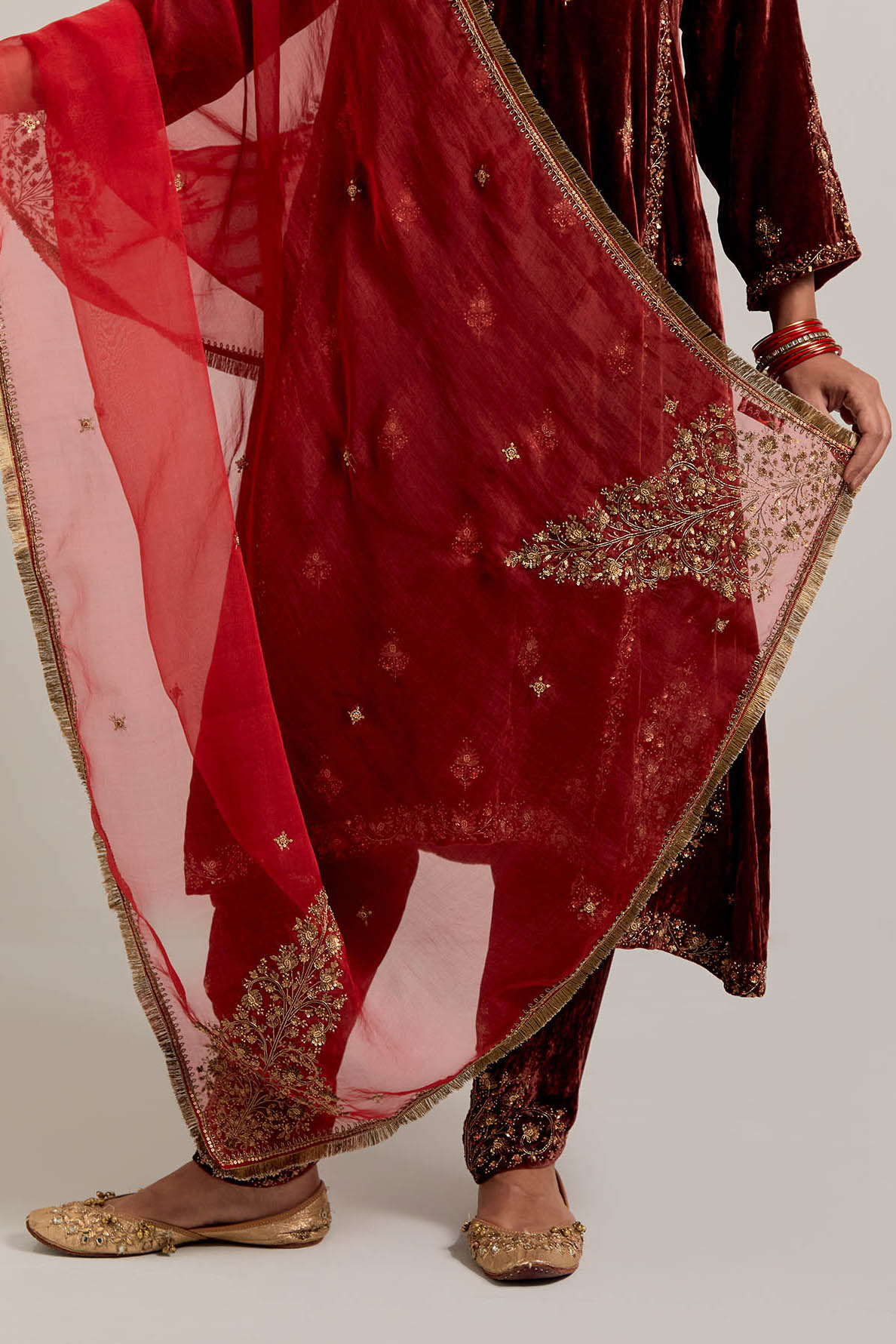 Burnt umber easy fit A-line, panelled, short kurta set in silk velvet with all-over hand embroidery at the neck, sleeves and hem.