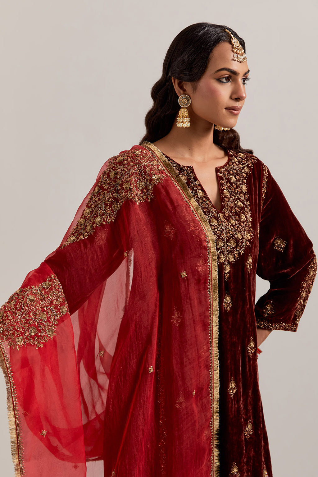 Burnt umber straight Silk Velvet kurta set with all-over hand-embroidered bead, sequins, zardozi and zari work.