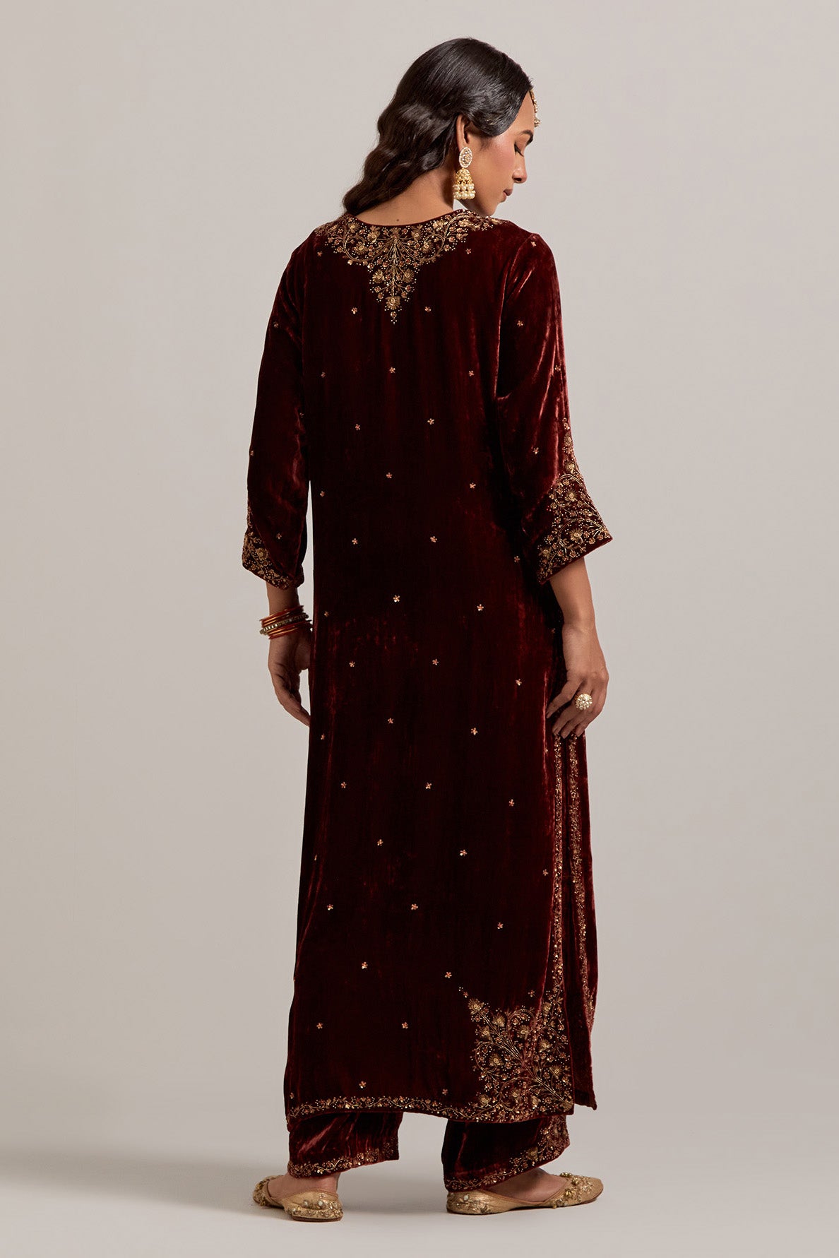 Burnt umber straight Silk Velvet kurta set with all-over hand-embroidered bead, sequins, zardozi and zari work.