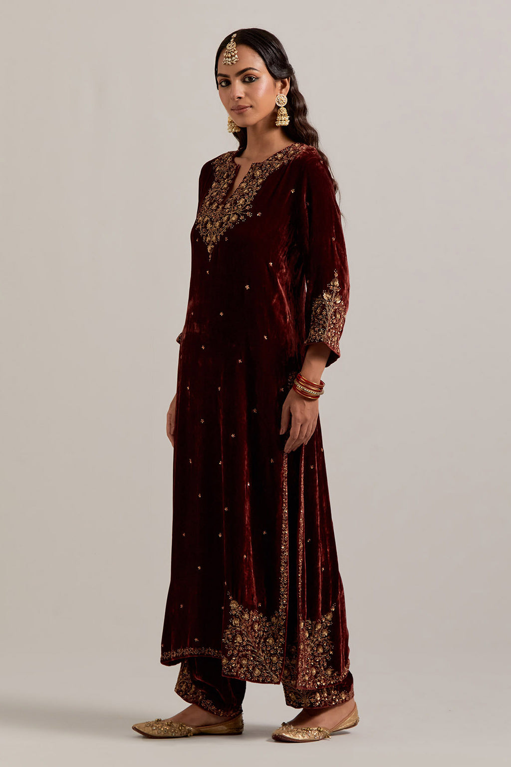 Burnt umber straight Silk Velvet kurta set with all-over hand-embroidered bead, sequins, zardozi and zari work.
