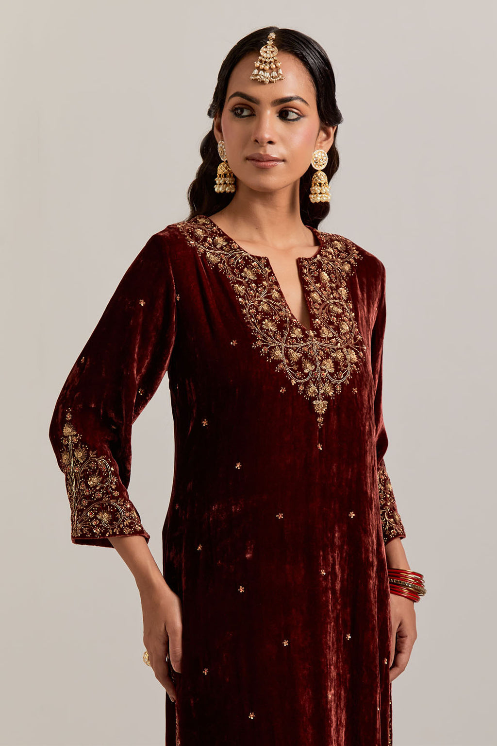 Burnt umber straight Silk Velvet kurta set with all-over hand-embroidered bead, sequins, zardozi and zari work.