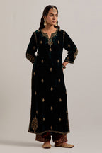 Dark green straight Silk Velvet kurta set with all-over hand-embroidered small floral booti with sequins, zardozi, bead and zari work.