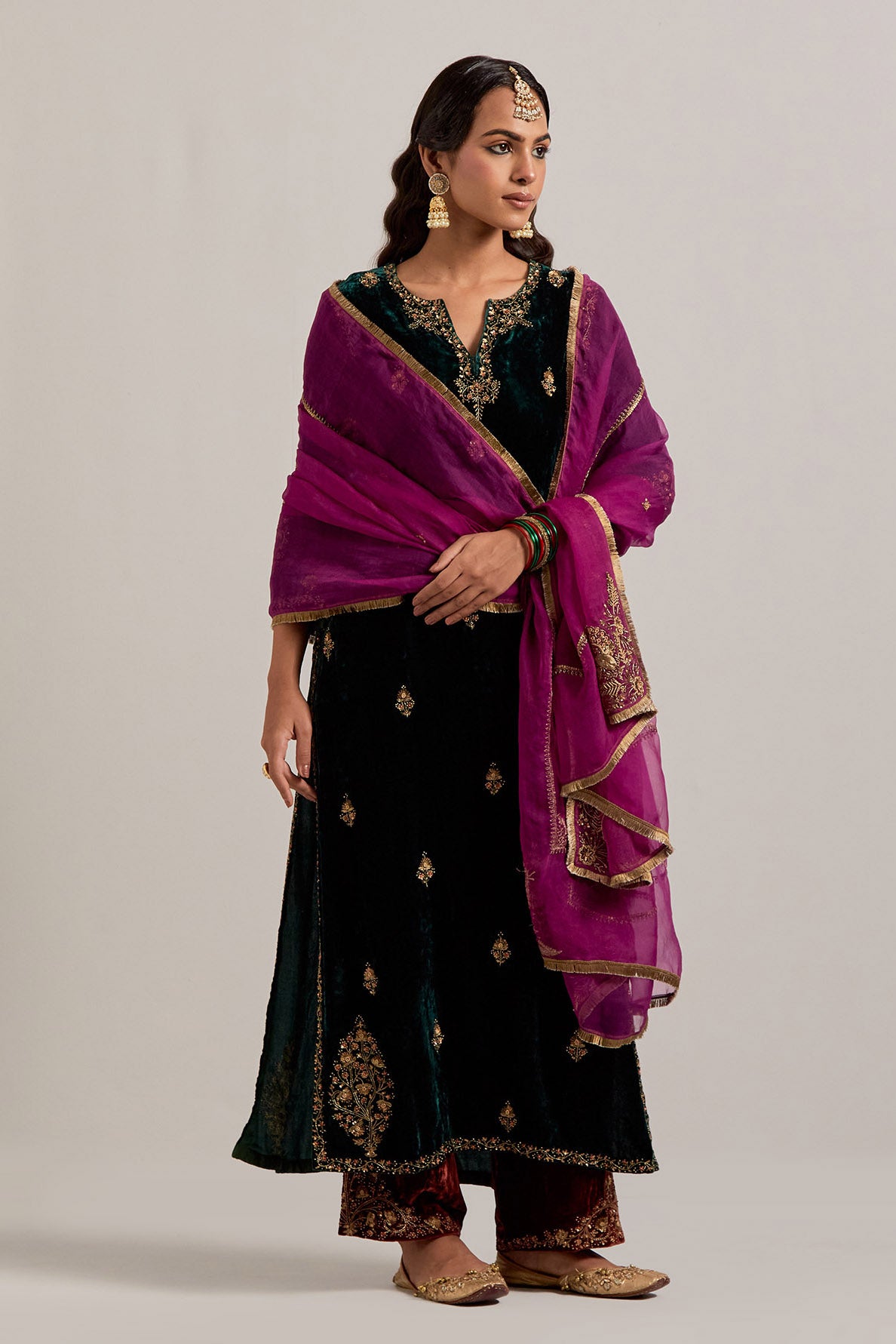 Dark green straight Silk Velvet kurta set with all-over hand-embroidered small floral booti with sequins, zardozi, bead and zari work.