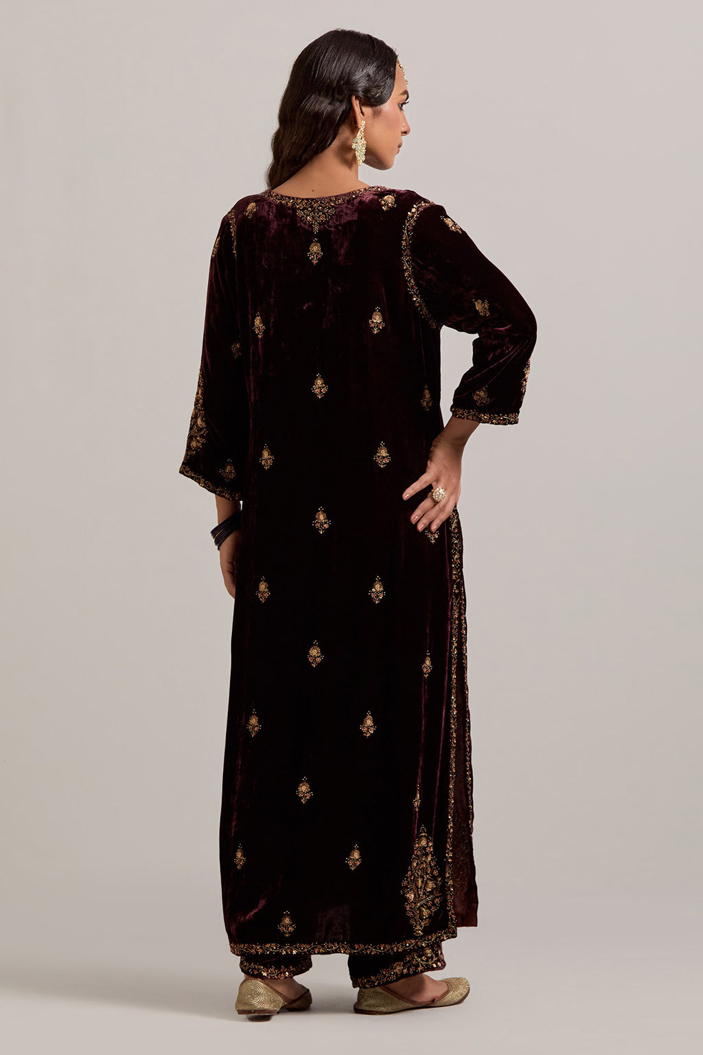 Rich brown straight Silk Velvet kurta set with all-over hand-embroidered small floral booti with sequins, zardozi, bead and zari work.