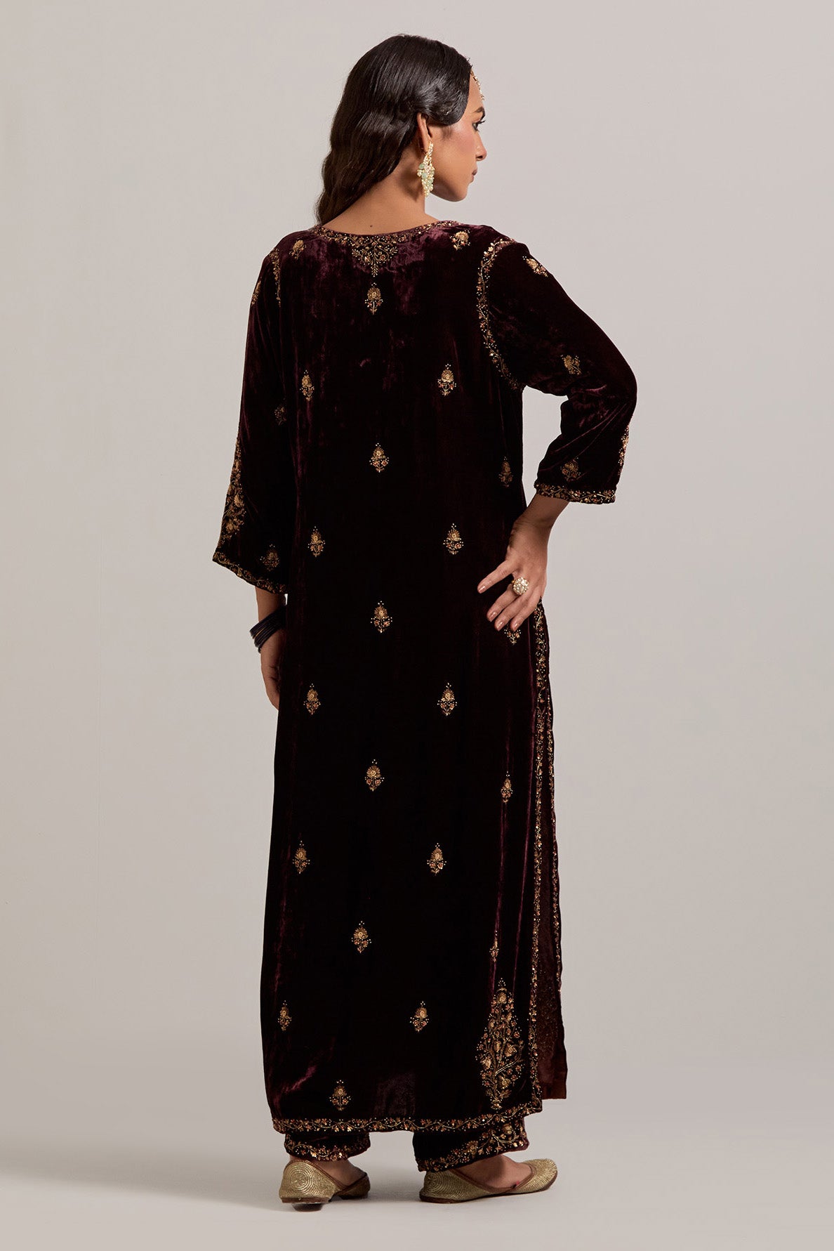 Rich brown straight Silk Velvet kurta set with all-over hand-embroidered small floral booti with sequins, zardozi, bead and zari work.