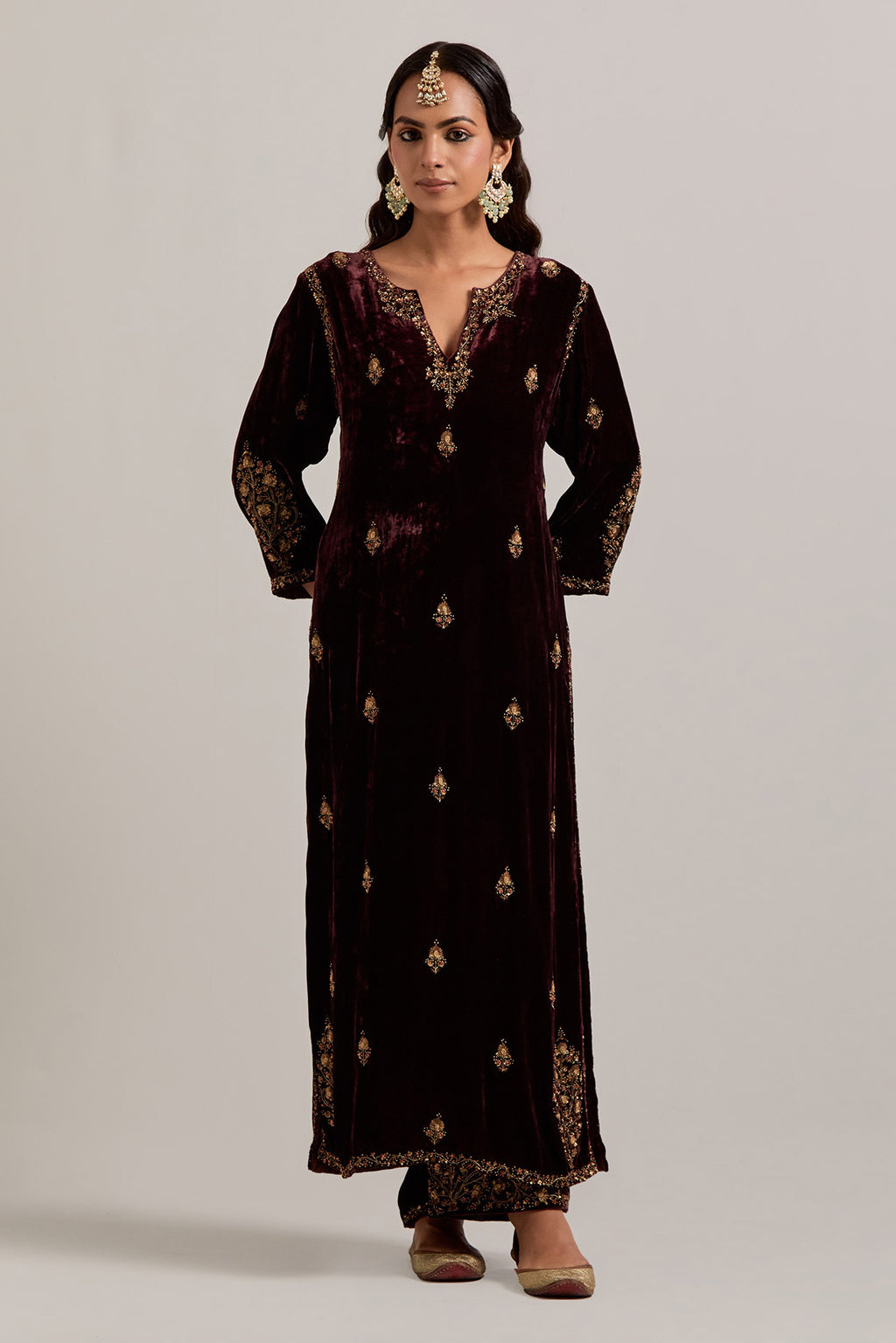 Rich brown straight Silk Velvet kurta set with all-over hand-embroidered small floral booti with sequins, zardozi, bead and zari work.