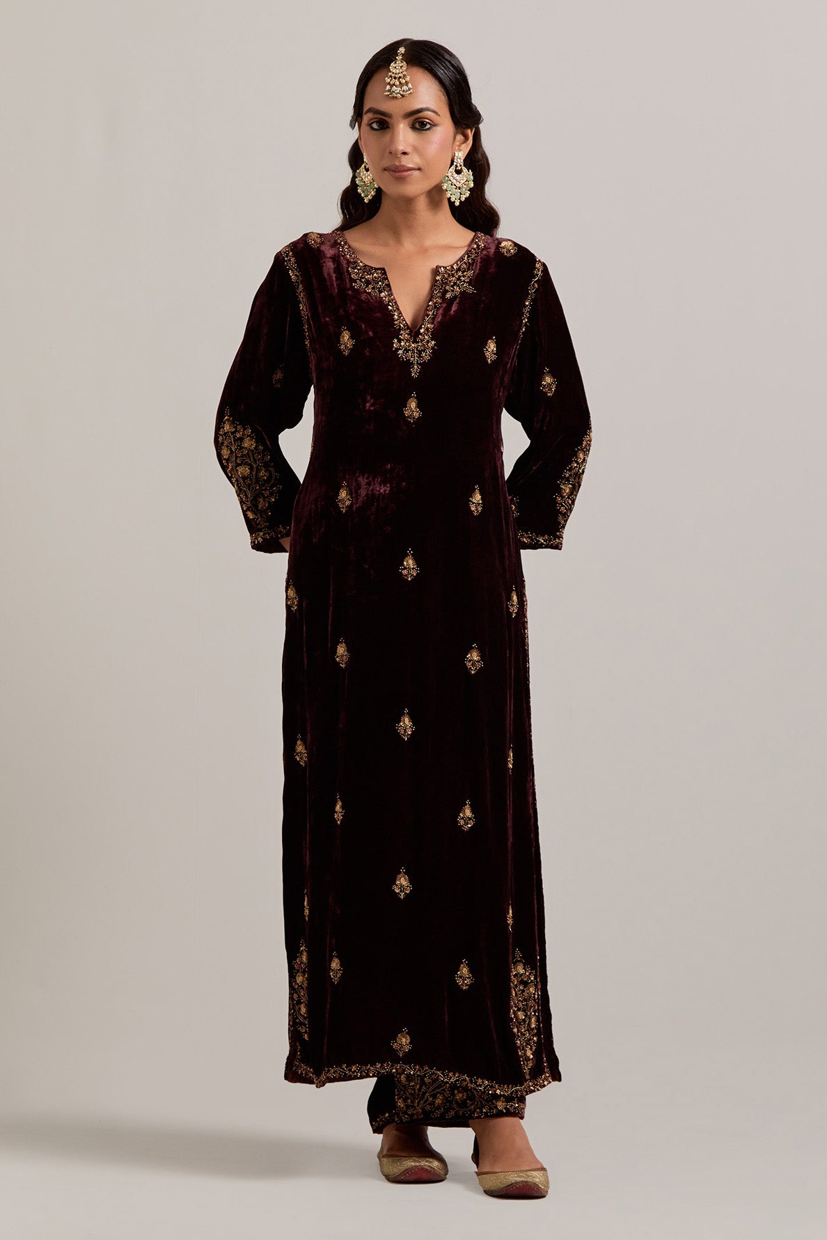 Rich brown straight Silk Velvet kurta set with all-over hand-embroidered small floral booti with sequins, zardozi, bead and zari work.