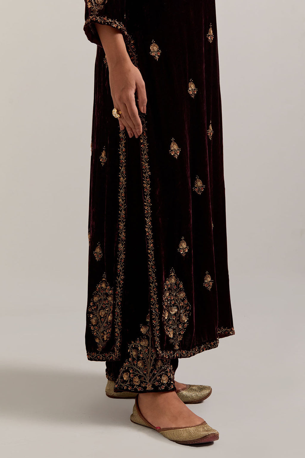 Rich brown straight Silk Velvet kurta set with all-over hand-embroidered small floral booti with sequins, zardozi, bead and zari work.