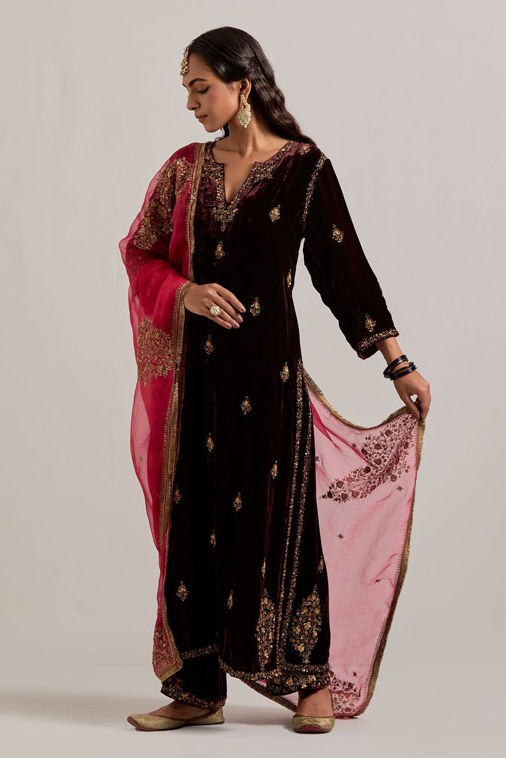 Rich brown straight Silk Velvet kurta set with all-over hand-embroidered small floral booti with sequins, zardozi, bead and zari work.