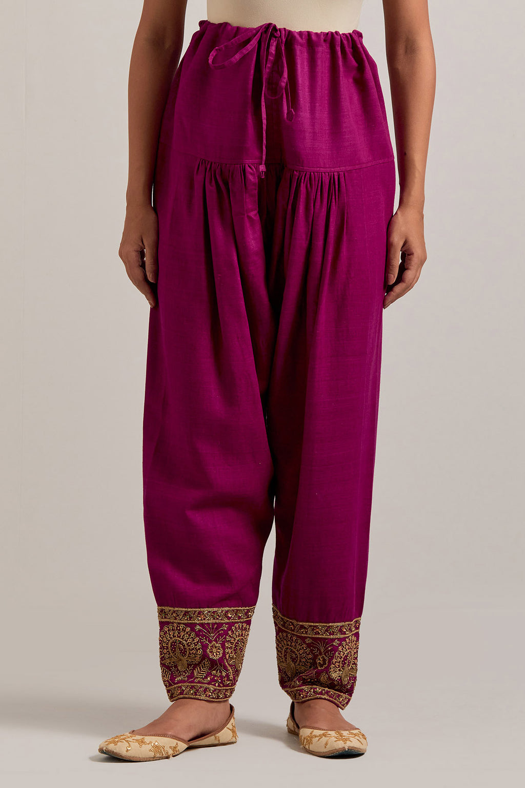 Fuchsia Matka silk salwar, highlighted with hand embroidered bead, sequins, zardozi and zari border at bottom hem.