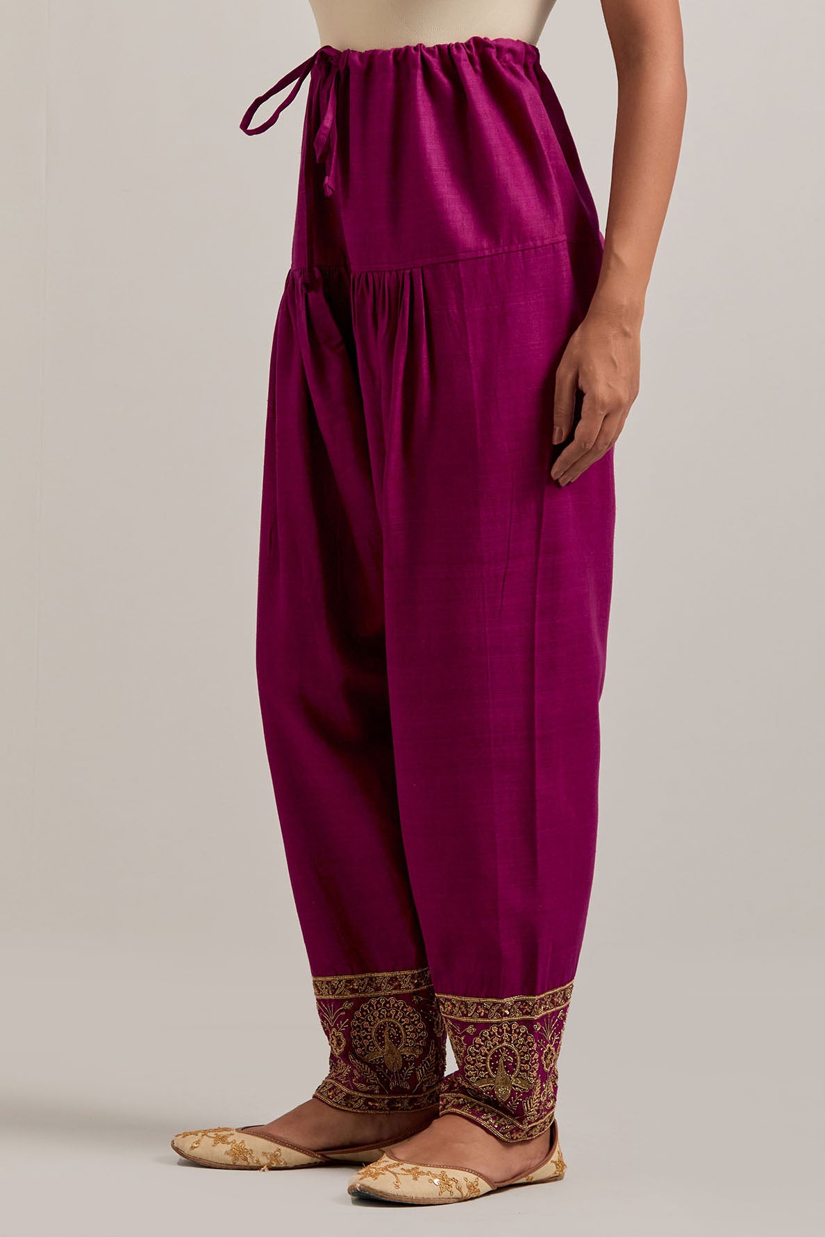 Fuchsia Matka silk salwar, highlighted with hand embroidered bead, sequins, zardozi and zari border at bottom hem.