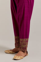 Fuchsia Matka silk salwar, highlighted with hand embroidered bead, sequins, zardozi and zari border at bottom hem.