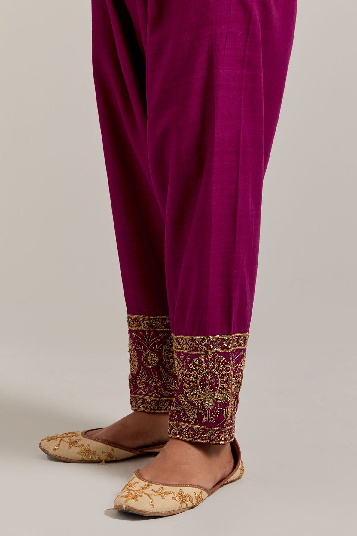 Fuchsia Matka silk salwar, highlighted with hand embroidered bead, sequins, zardozi and zari border at bottom hem.