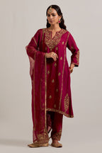 Ruby red easy fit A-line, panelled, short kurta set in Matka silk with all-over hand embroidery at the neck, sleeves and hem.