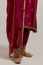 Ruby red easy fit A-line, panelled, short kurta set in Matka silk with all-over hand embroidery at the neck, sleeves and hem.