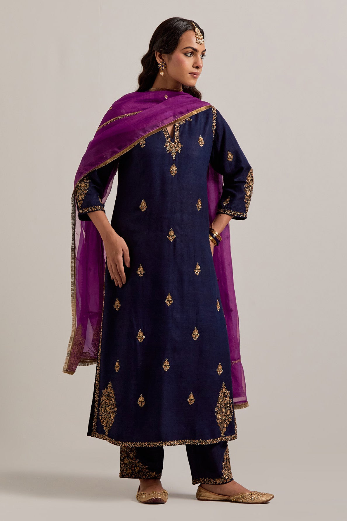 Navy blue straight Matka silk kurta set with all-over hand-embroidered small floral booti with sequins, zardozi, bead and zari work.
