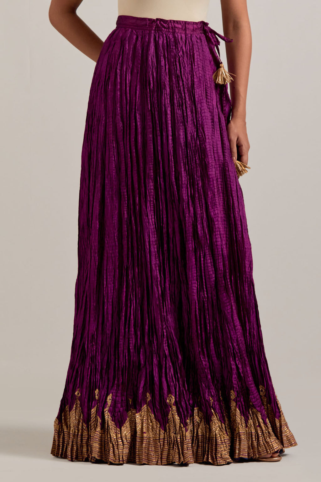 Wine Silk long choli set with all-over sequins, zardozi and zari handwork, highlighted with contrast-colored beads.