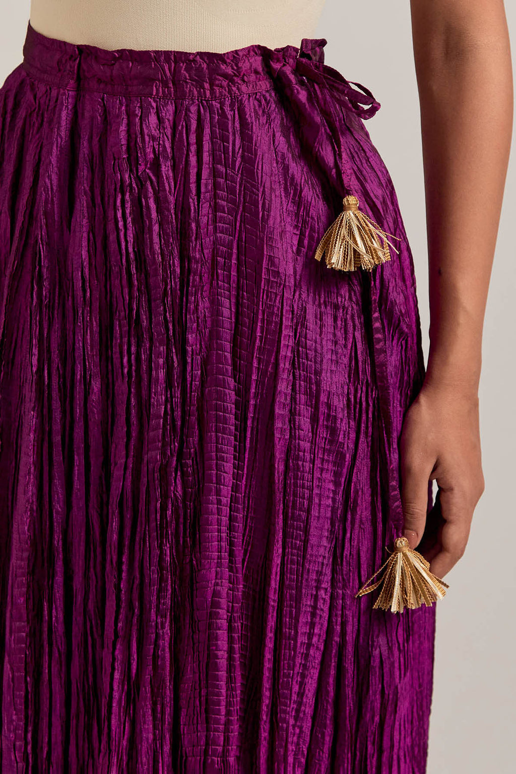Wine Silk long choli set with all-over sequins, zardozi and zari handwork, highlighted with contrast-colored beads.