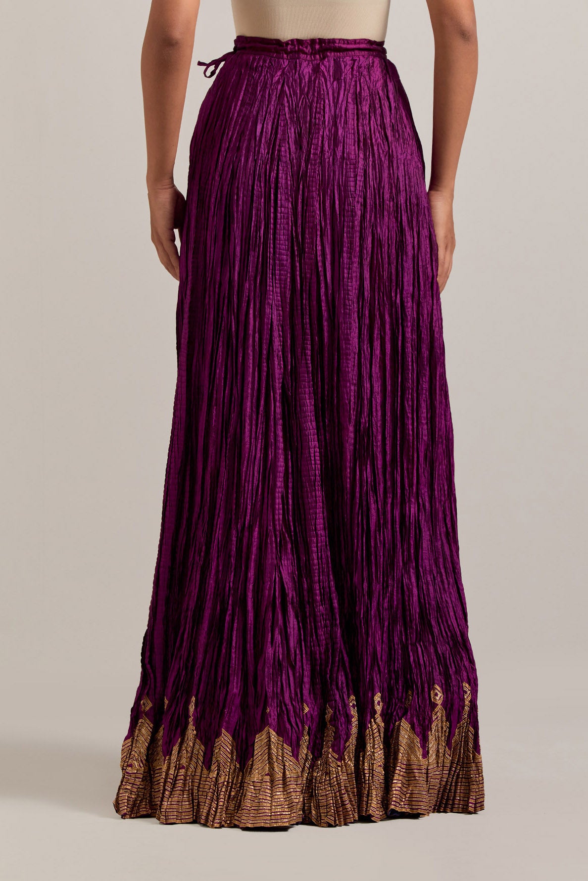 Wine Silk long choli set with all-over sequins, zardozi and zari handwork, highlighted with contrast-colored beads.