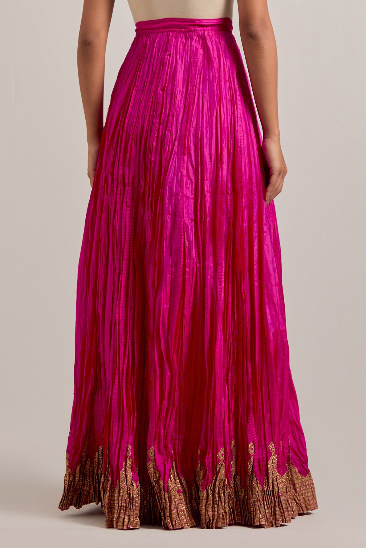 Fuchsia Silk Choli set with all-over sequins, zardozi and zari handwork, highlighted with contrast-colored beads.