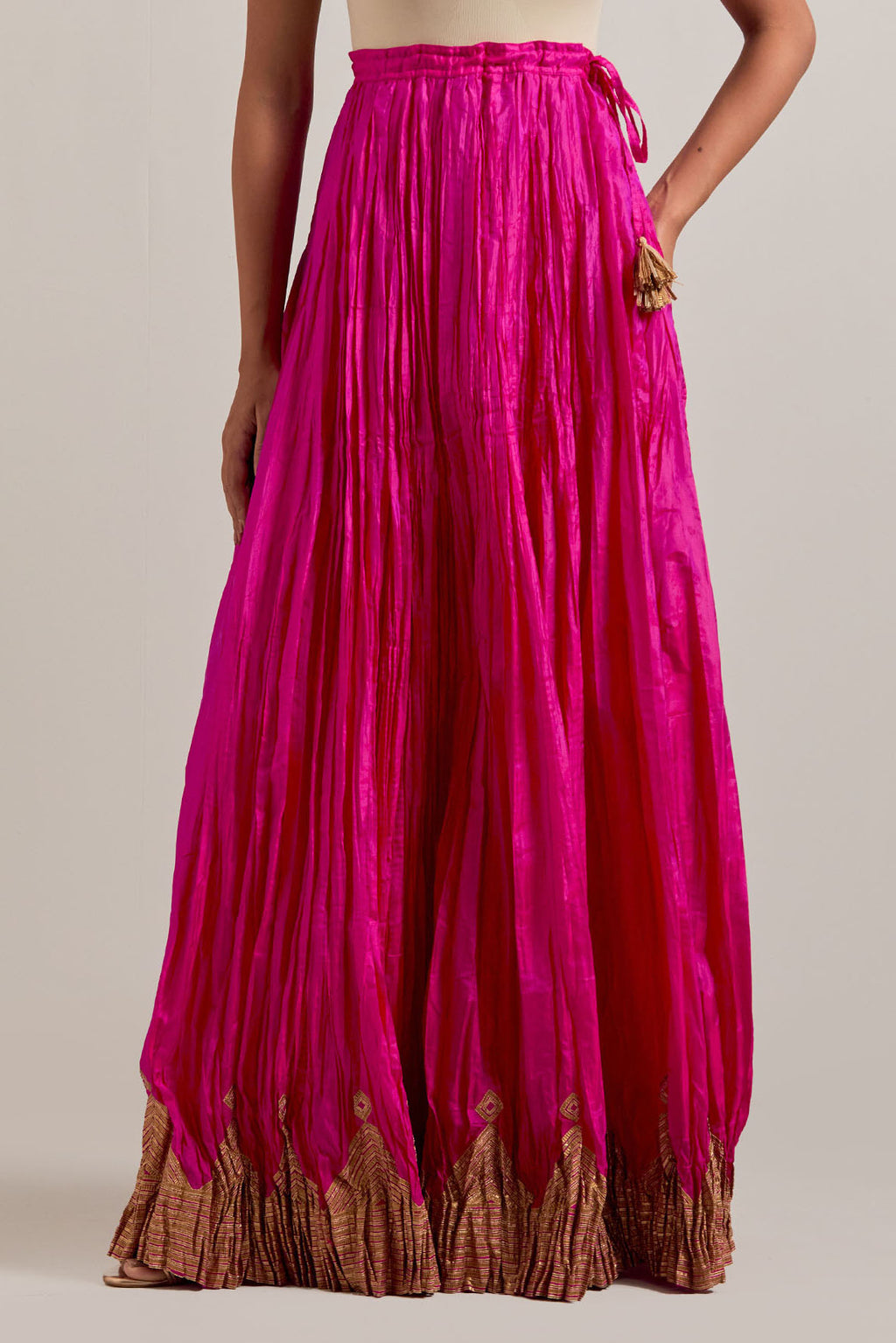 Fuchsia Silk Choli set with all-over sequins, zardozi and zari handwork, highlighted with contrast-colored beads.