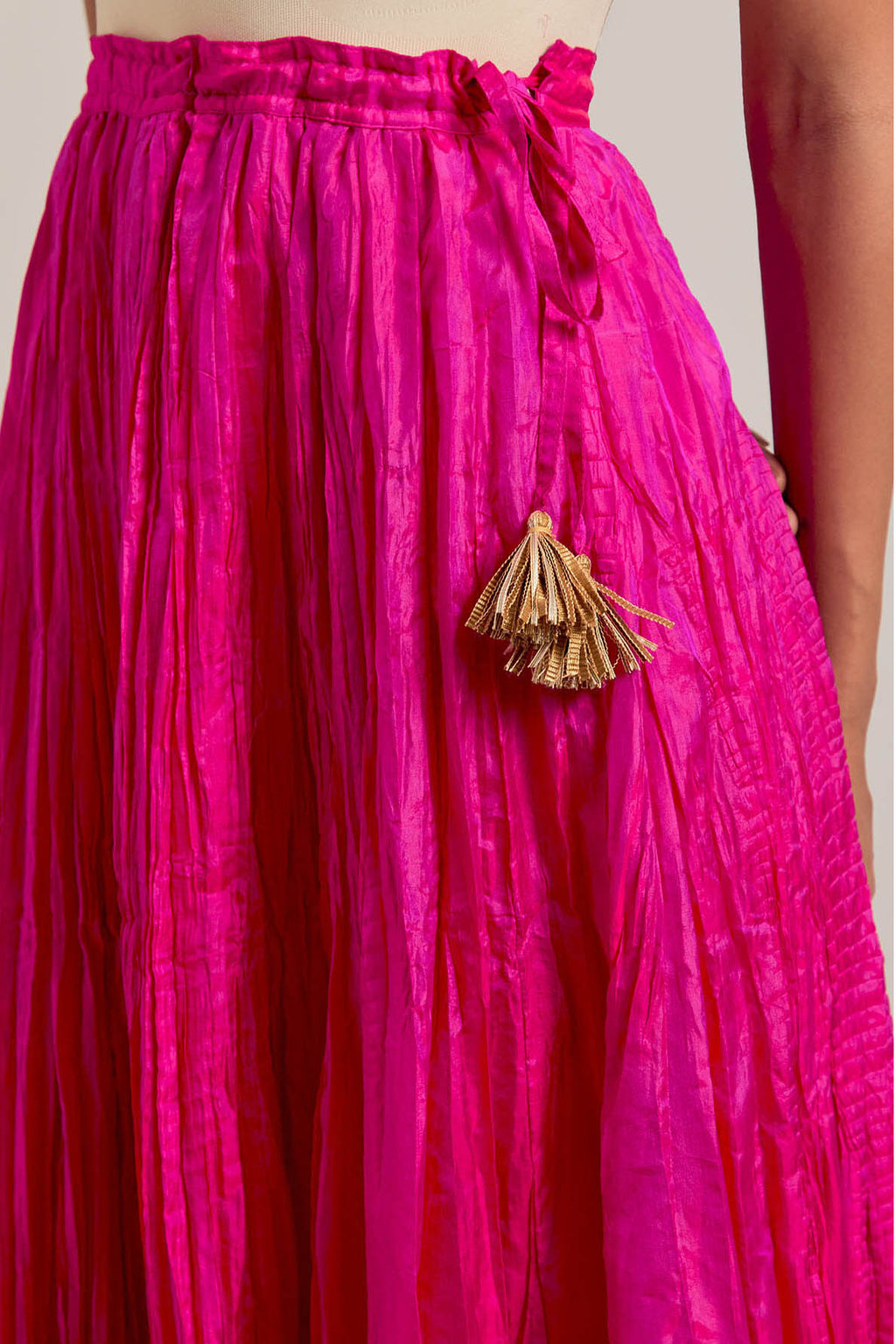 Fuchsia Silk Choli set with all-over sequins, zardozi and zari handwork, highlighted with contrast-colored beads.