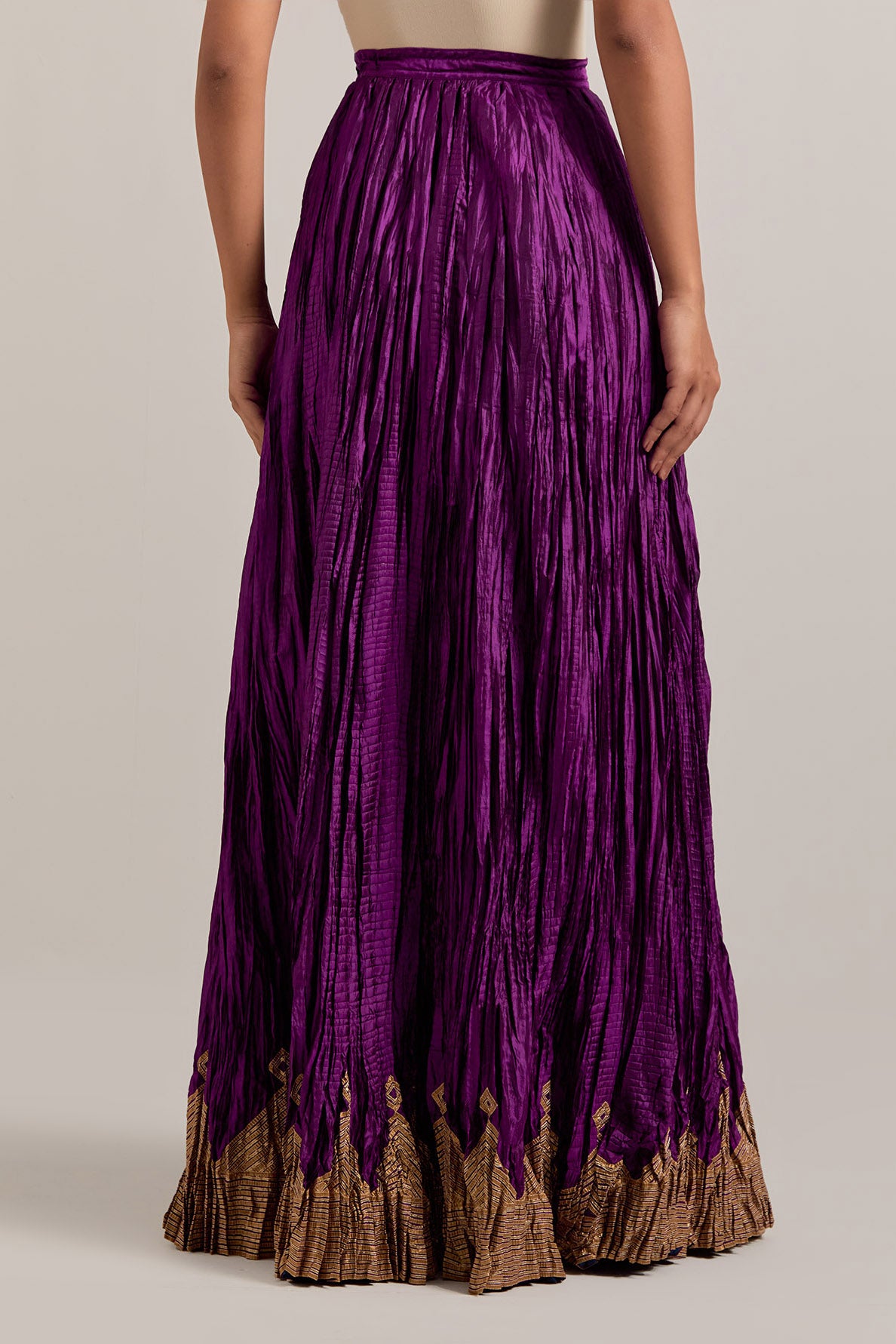 Purple Silk choli set with all-over sequins, zardozi and zari handwork, highlighted with contrast-colored beads.