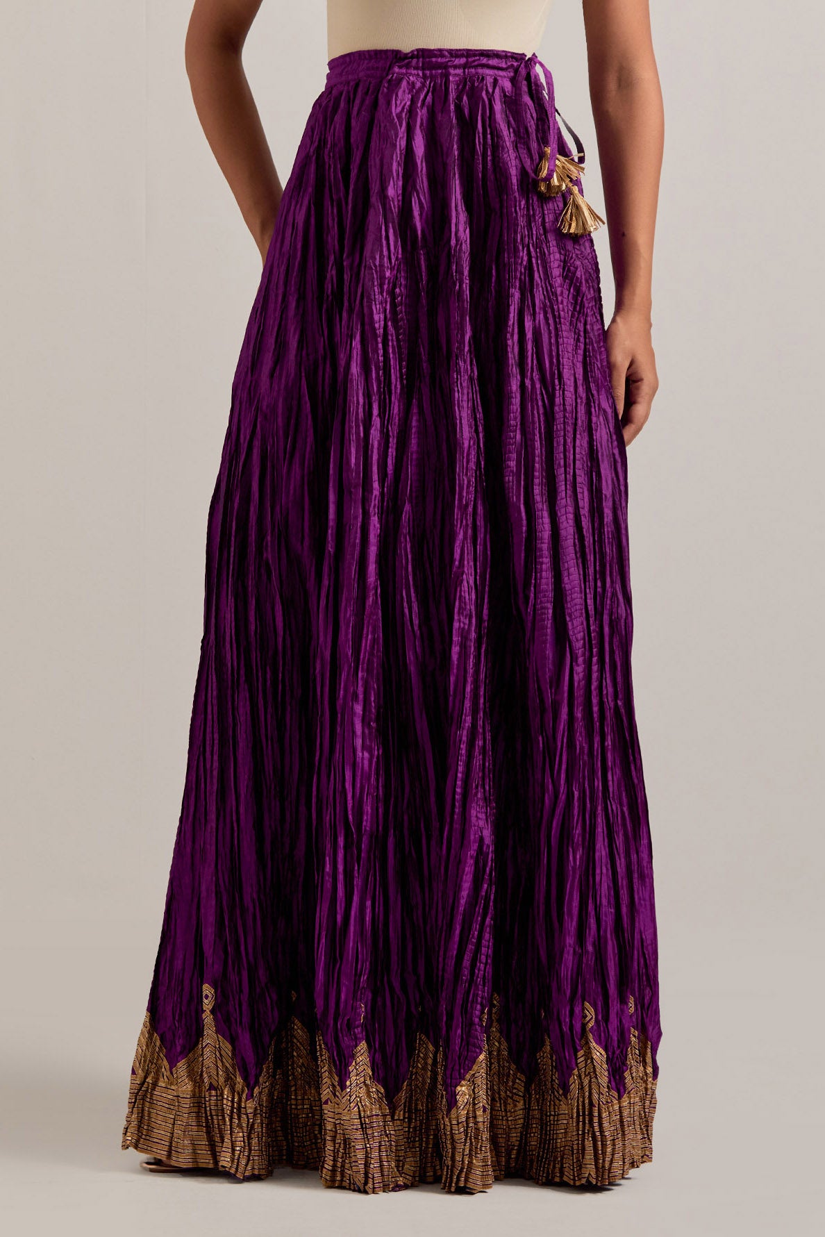 Purple Silk choli set with all-over sequins, zardozi and zari handwork, highlighted with contrast-colored beads.