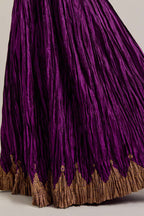 Purple Silk choli set with all-over sequins, zardozi and zari handwork, highlighted with contrast-colored beads.