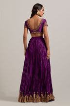 Purple Silk choli set with all-over sequins, zardozi and zari handwork, highlighted with contrast-colored beads.