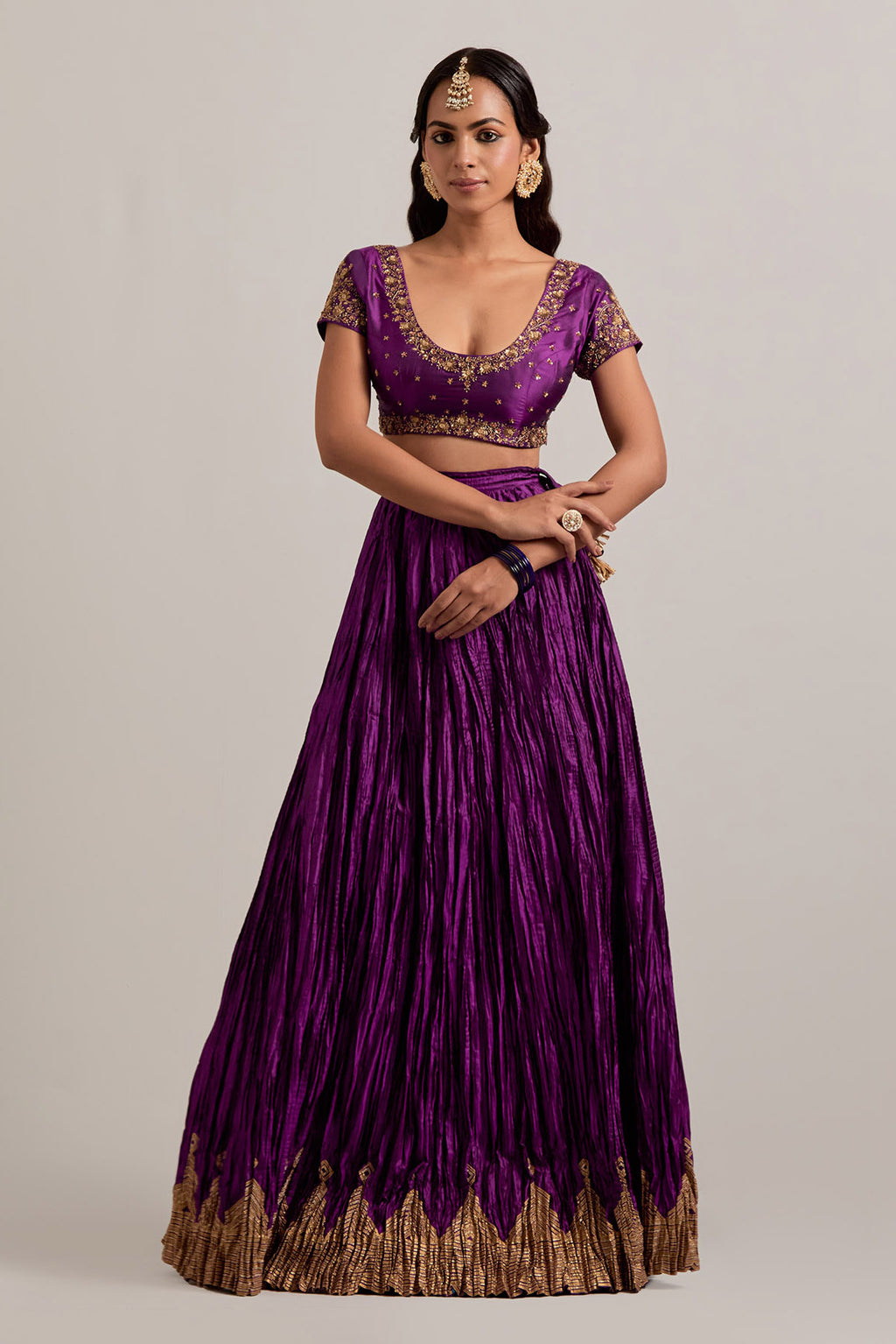 Purple Silk choli set with all-over sequins, zardozi and zari handwork, highlighted with contrast-colored beads.