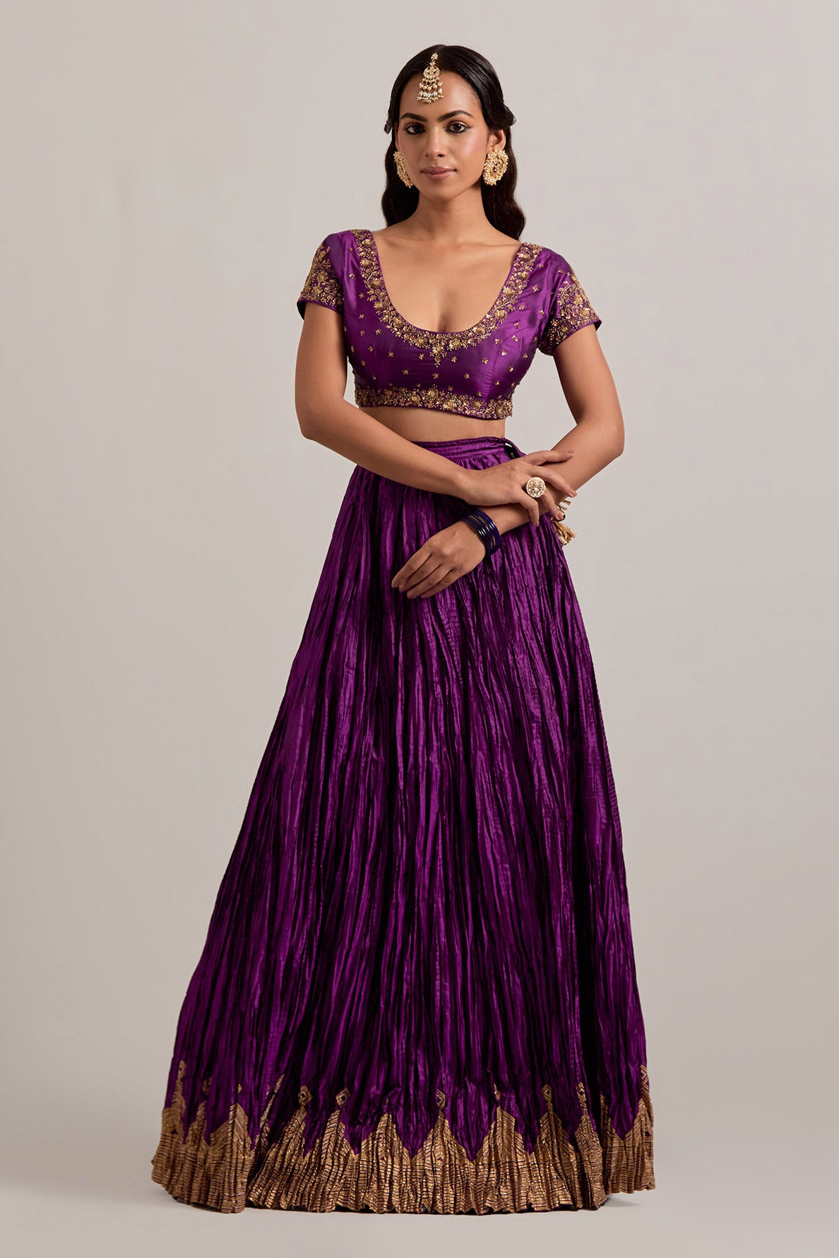 Purple Silk choli set with all-over sequins, zardozi and zari handwork, highlighted with contrast-colored beads.