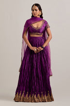 Purple Silk choli set with all-over sequins, zardozi and zari handwork, highlighted with contrast-colored beads.