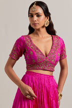 Fuchsia Silk Choli set with all-over sequins, zardozi and zari handwork, highlighted with contrast-colored beads.