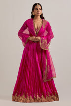 Fuchsia Silk Choli set with all-over sequins, zardozi and zari handwork, highlighted with contrast-colored beads.