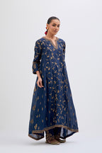 Prussian Blue Silk Chanderi kurta set with asymmetric hem and all-over dull gold dori embroidery, highlighted with multi colored beads and gold sequins.