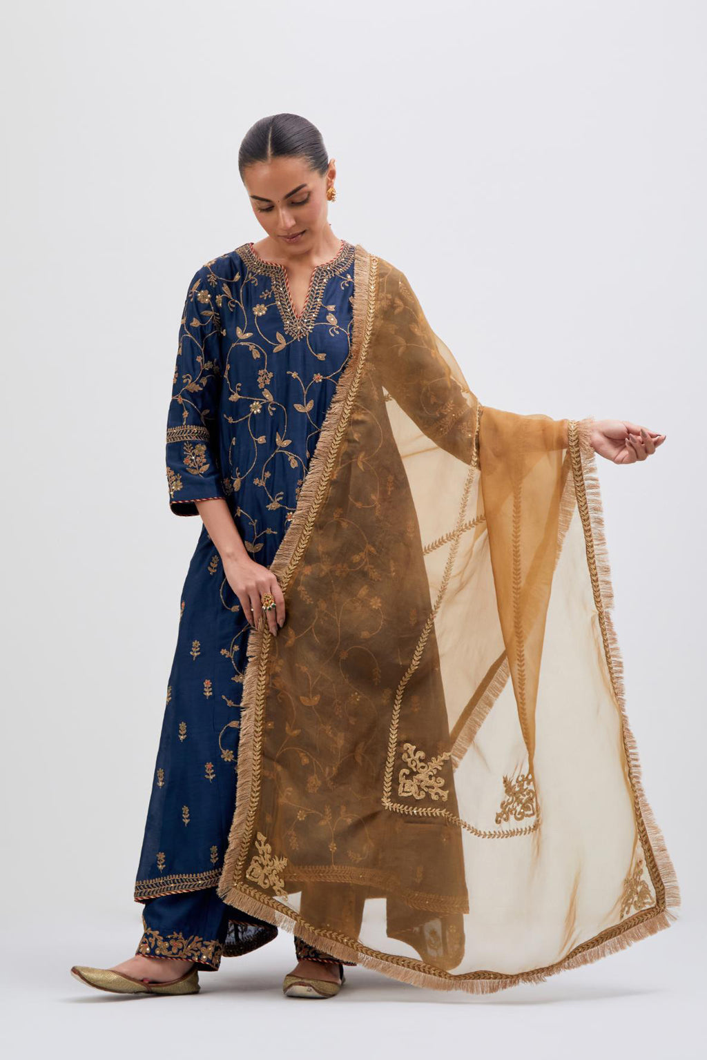 Olive Silk Organza dupatta detailed with all-over dull gold dori embroidery, highlighted with multi colored beads and gold sequins work.